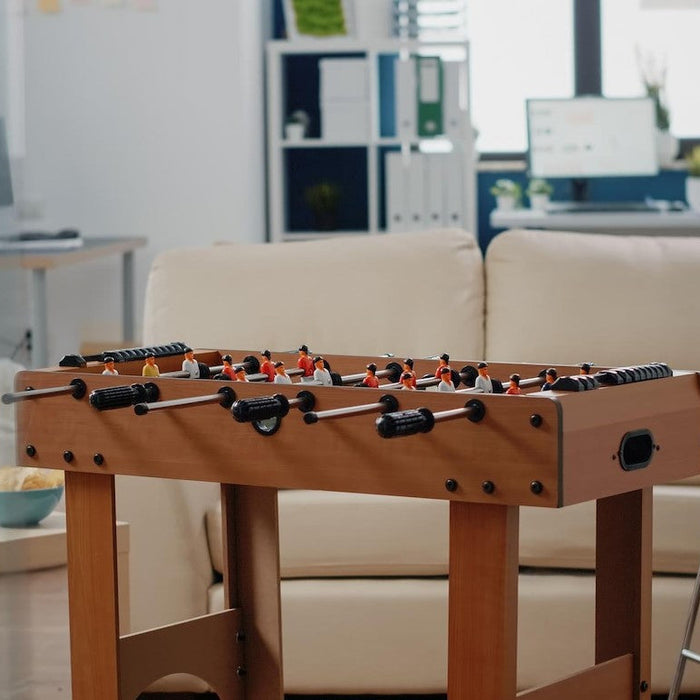 A professional Foosball Table placed in the lobby of an office 