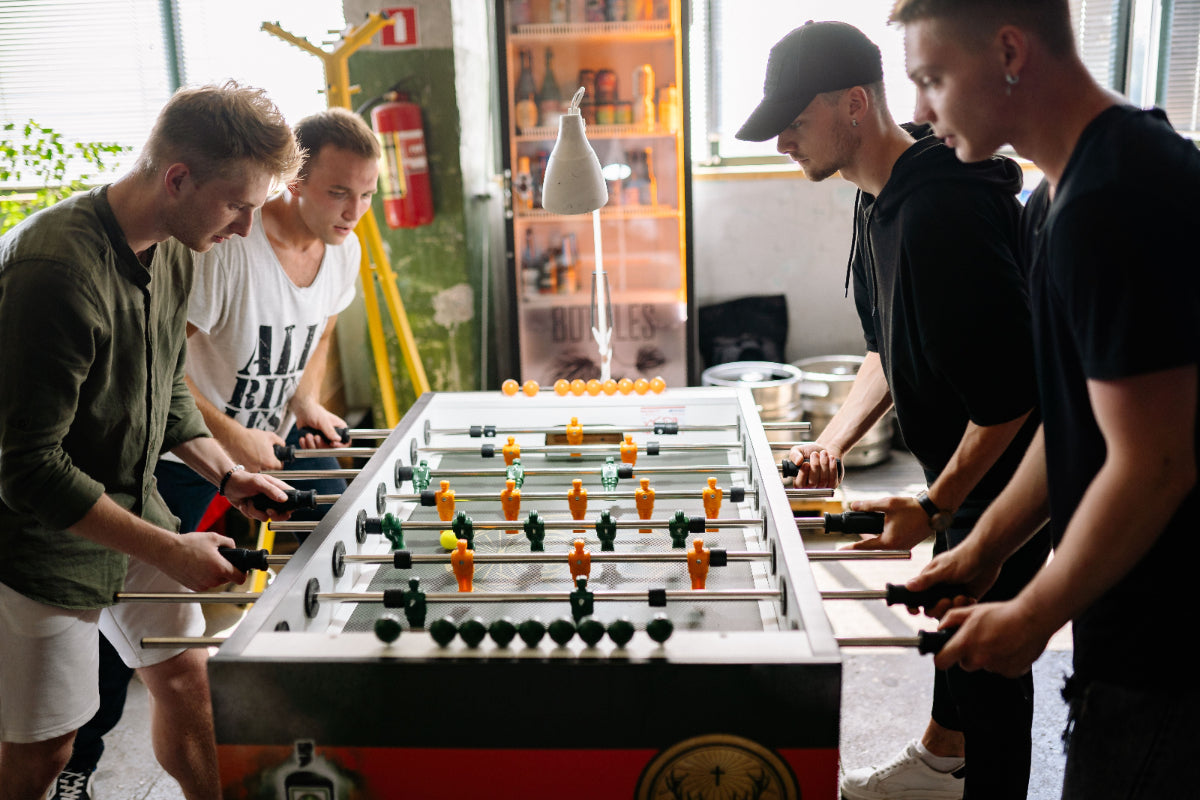 People playing foosball together