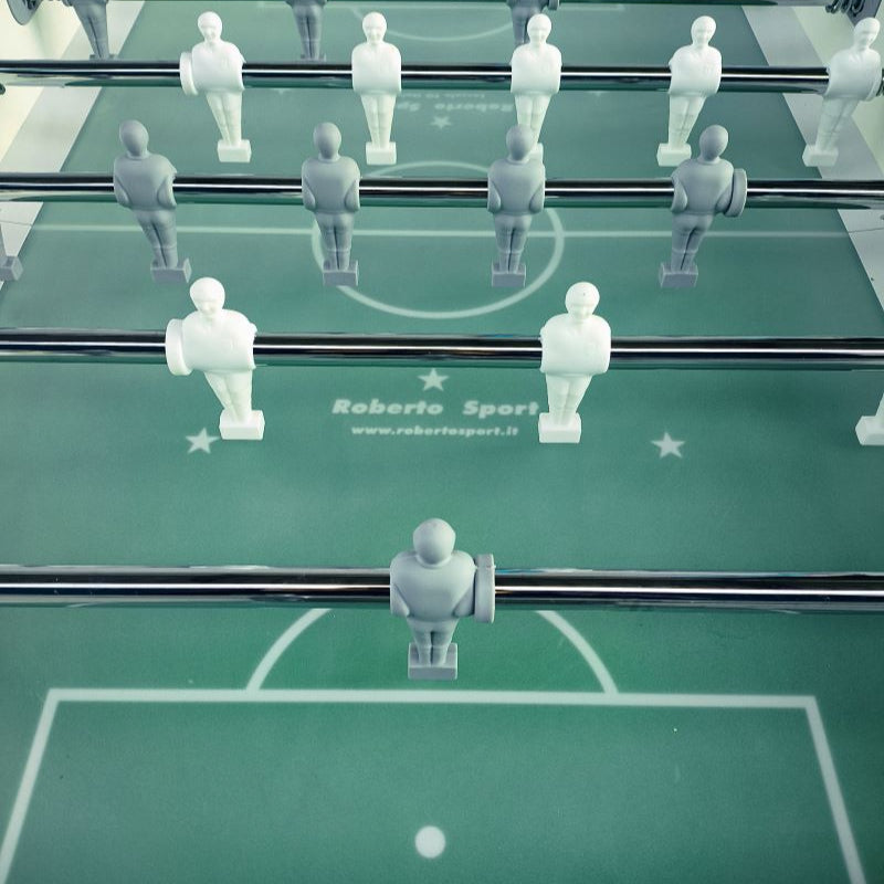 Roberto Sport Ermes Foosball Talbe close-up of a foosball table with white player figures on a green surface image