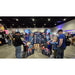 Two Atari Asteroids Recharged arcade cabinets by Alan-1 being played at the manufacturer's booth during Pinball Expo 2024.