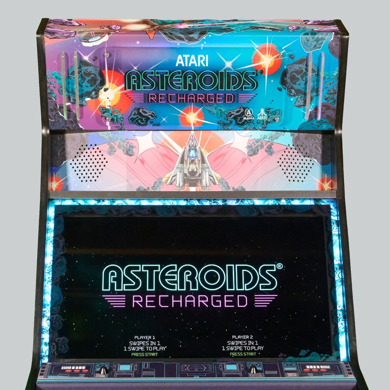 Atari Asteroids Recharged Pro arcade cabinet by Alan-1 front view showing illuminated marquee, 32-inch monitor, and dual player control panel with backlit buttons.