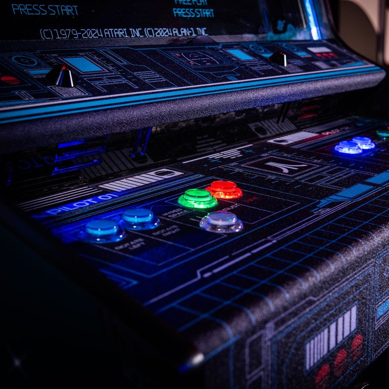 Atari Asteroids Recharged Pro arcade cabinet by Alan-1 control panel with illuminated player buttons including Rotate Left, Rotate Right, Thrust, Fire, and Hyperspace controls.