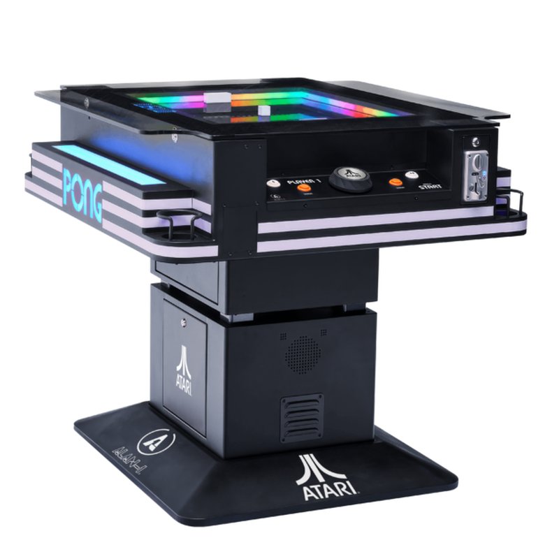 Atari PONG Mechanical Table Commercial Edition, angled view on pedestal base, glowing RGB playfield, spinners, coin door.