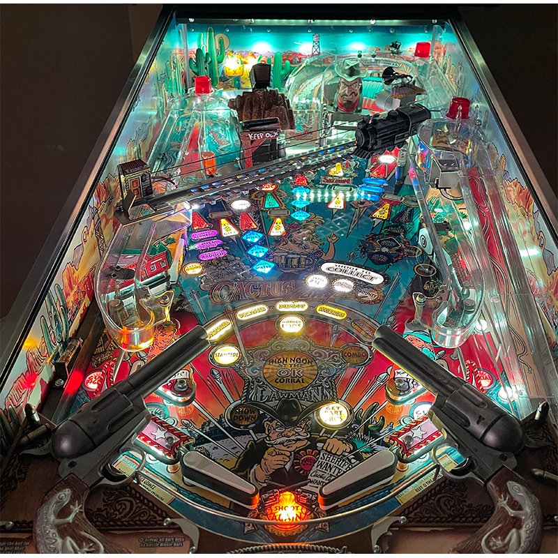 Chicago Gaming Cactus Canyon Remake Special Edition pinball machine playfield overview showing flippers, ramps, and lit targets from player perspective image