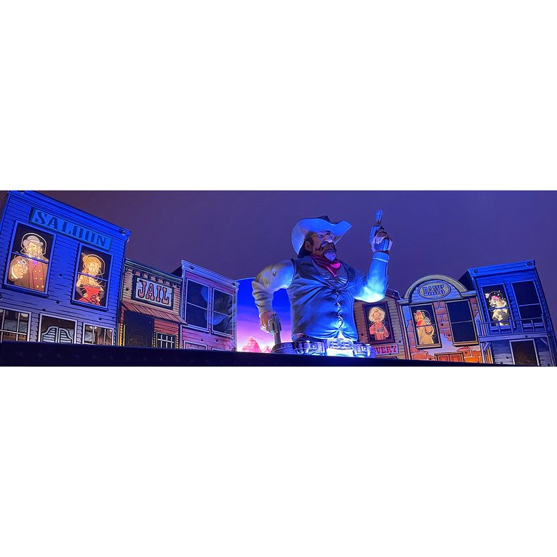 Chicago Gaming Cactus Canyon Remake Special Edition commercial pinball machine, backbox and playfield visible at night with illuminated signage display image