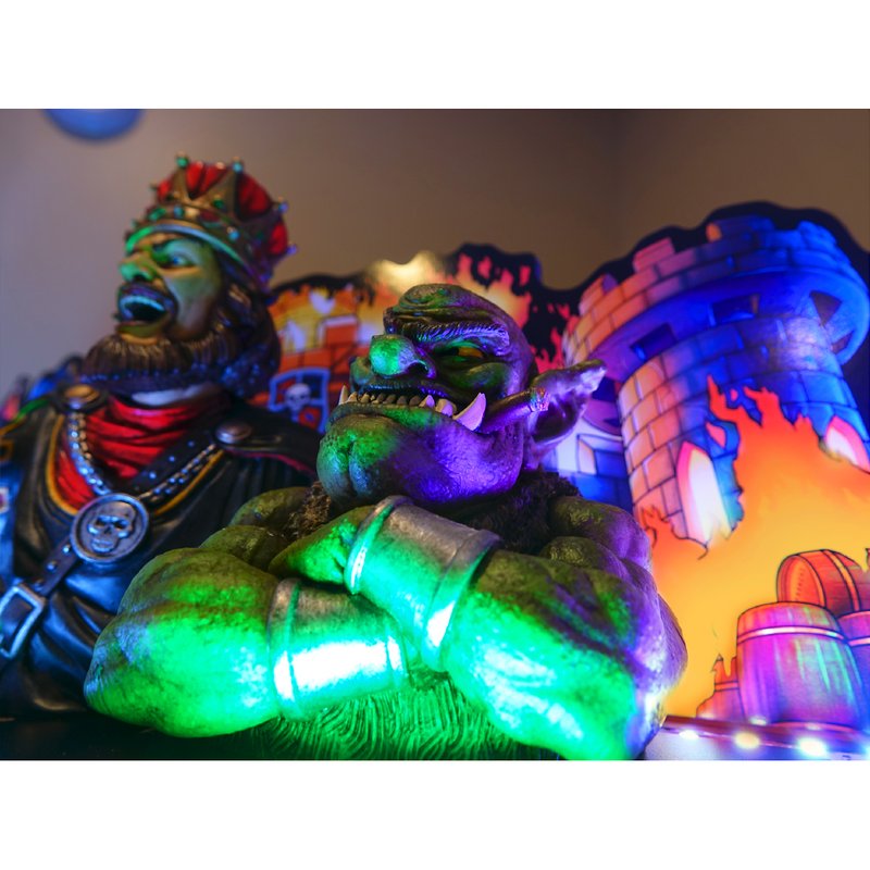 Chicago Gaming Medieval Madness Remake Merlin Edition pinball machine home model with illuminated monster and character figurines detail view