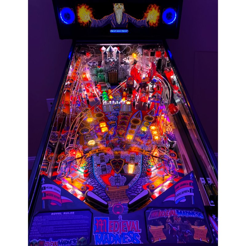 Chicago Gaming Medieval Madness Remake Merlin Edition pinball machine home model, full playfield view with all lights illuminated during gameplay image
