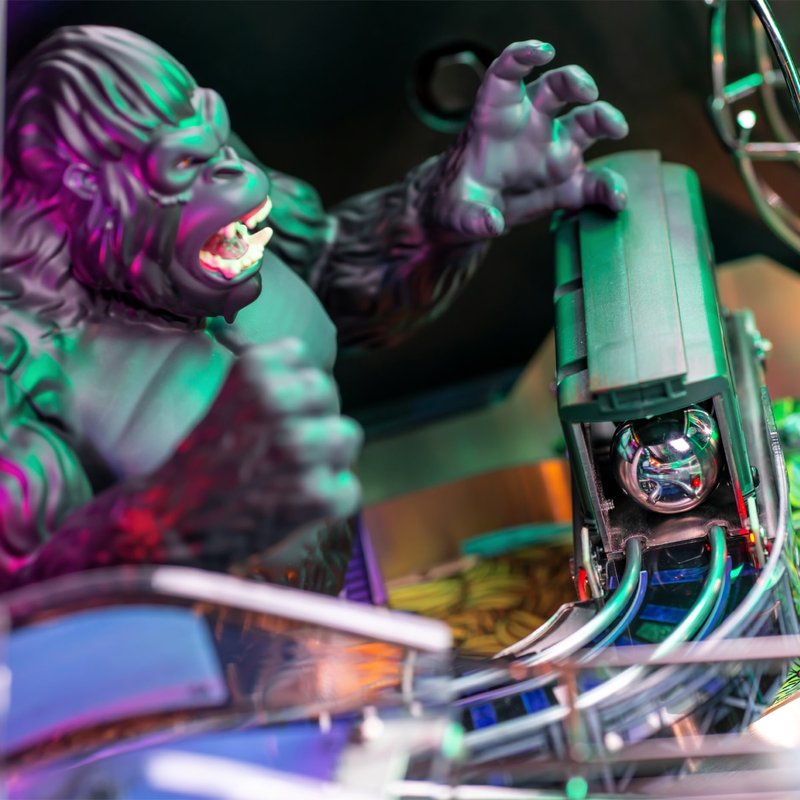 Stern King Kong Myth of Terror Island Premium Pinball Machine commercial pinball featuring custom animatronic King Kong figure with swinging arms and torso mechanism close-up detail view