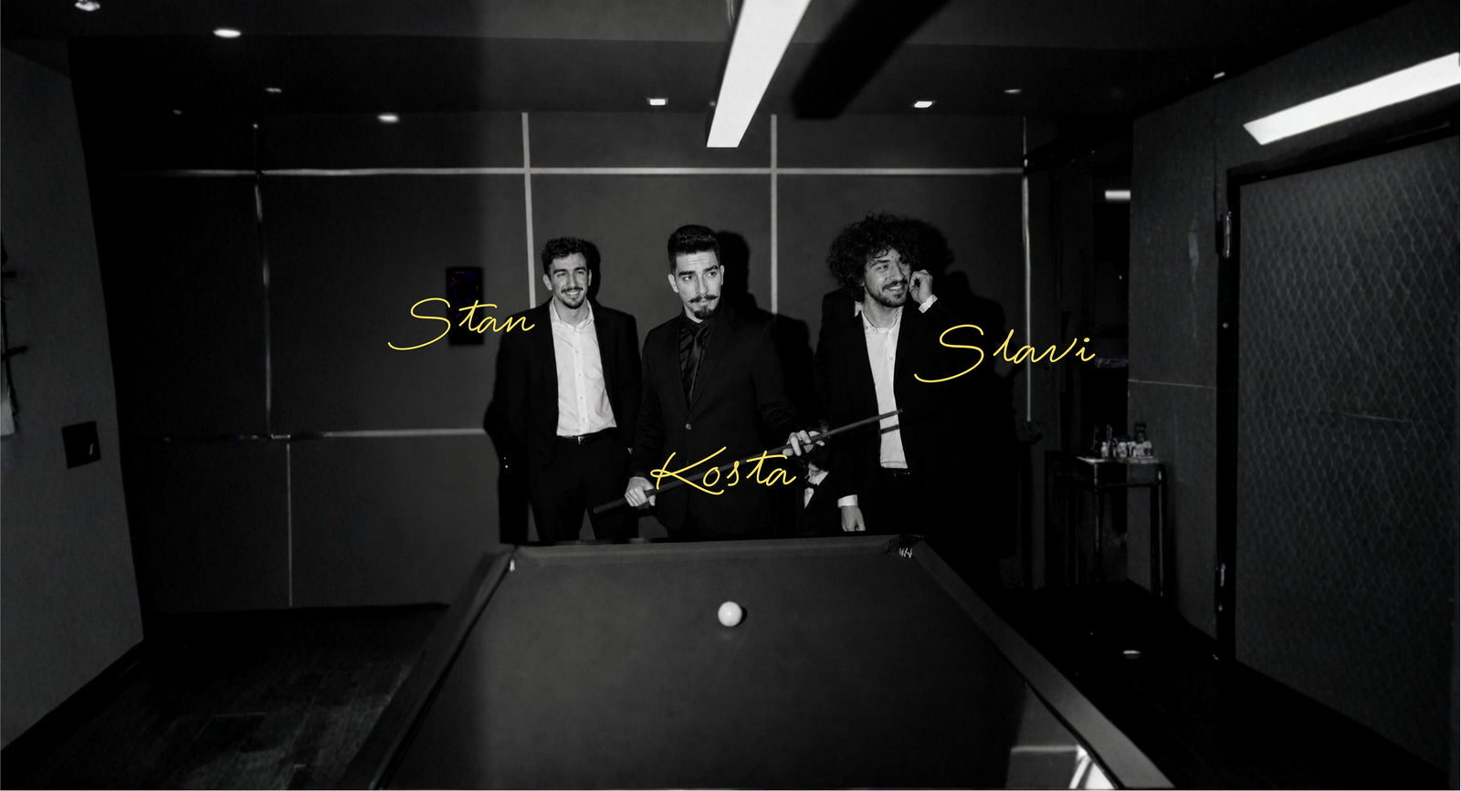 Stan, Kosta and Slavi from Mancave Empire around a pool table
