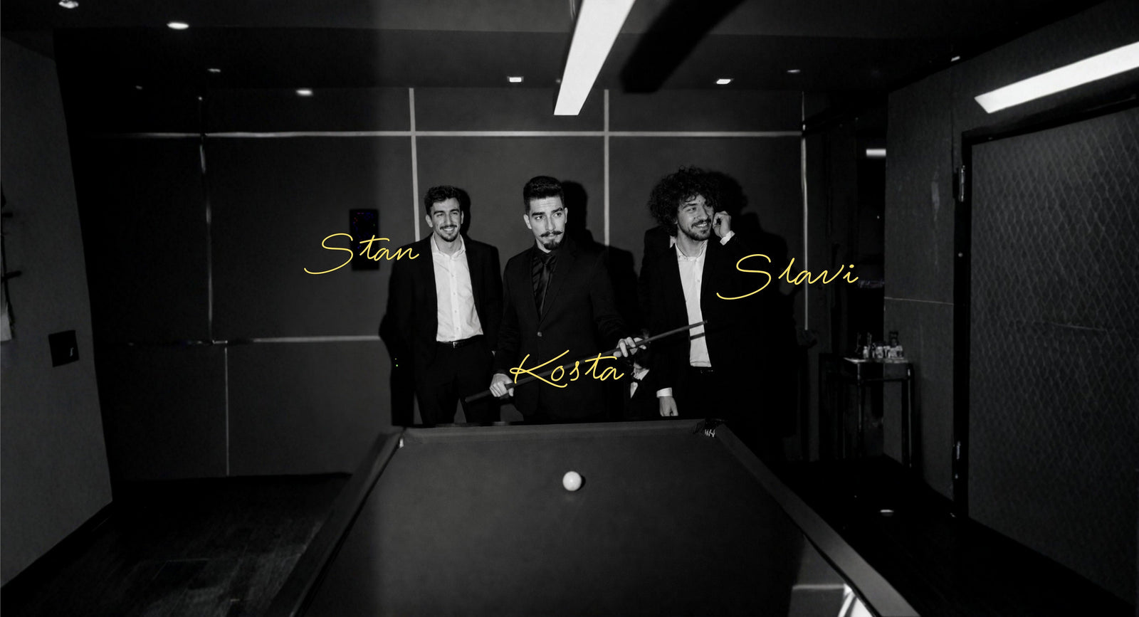 Stan, Kosta and Slavi from Mancave Empire around a pool table