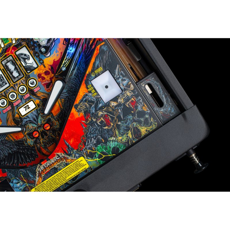 Stern Metallica Remastered Premium pinball machine playfield detail showing Coffin ball lock window, pop bumpers, and illuminated targets.