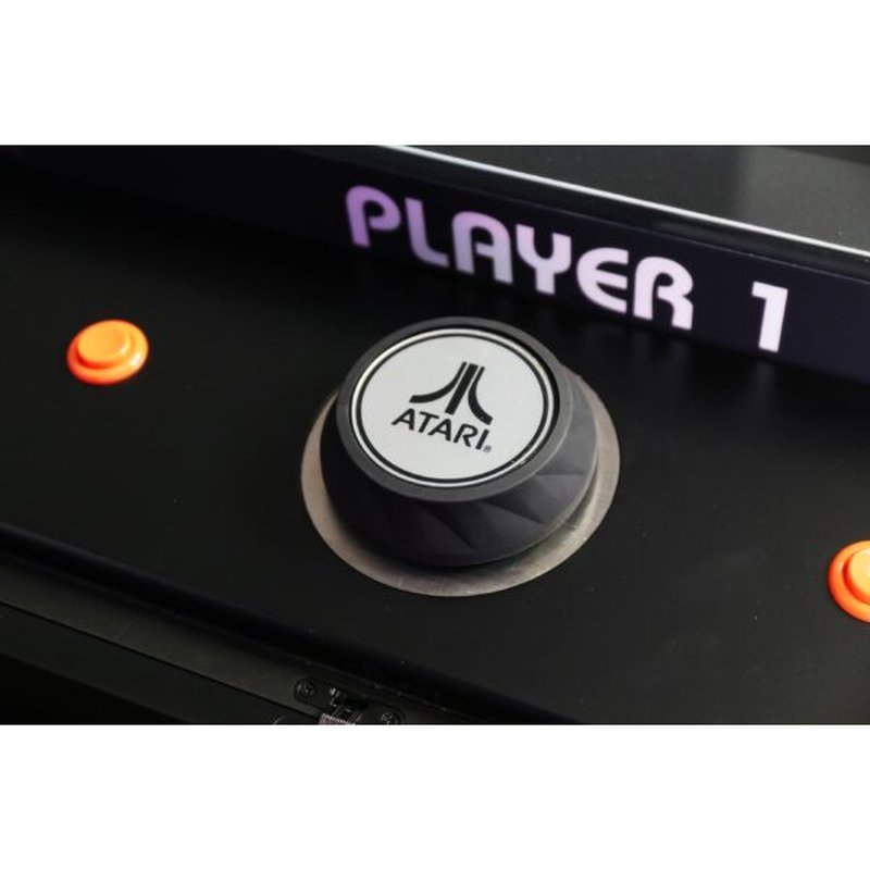 Atari PONG Mechanical Table Home Edition, close-up of spinner dial with Atari logo, Player 1 label.