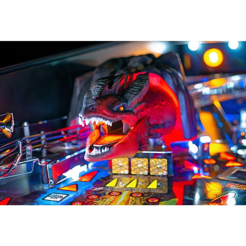 Stern Dungeons & Dragons: The Tyrant's Eye Premium Pinball Machine playfield close-up showing red dragon toy and illuminated ramps.