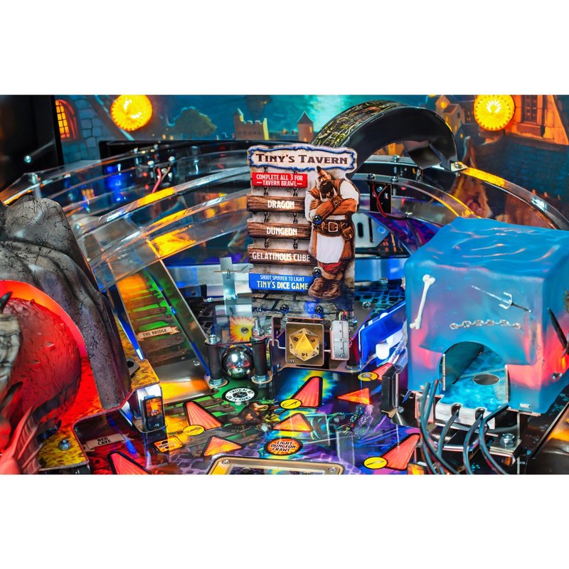 Stern Dungeons & Dragons: The Tyrant's Eye Premium Pinball Machine commercial playfield overview with castle backdrop and character figurines