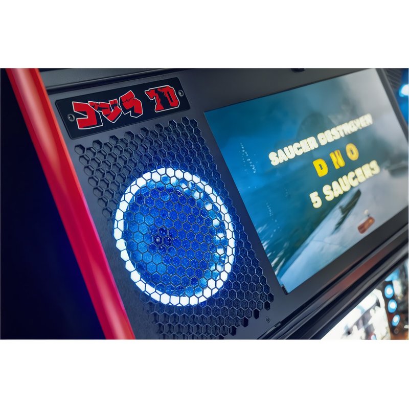 Stern Dungeons & Dragons: The Tyrant's Eye Premium Pinball Machine speaker panel close-up showing illuminated blue speaker cover on commercial coin-operated machine