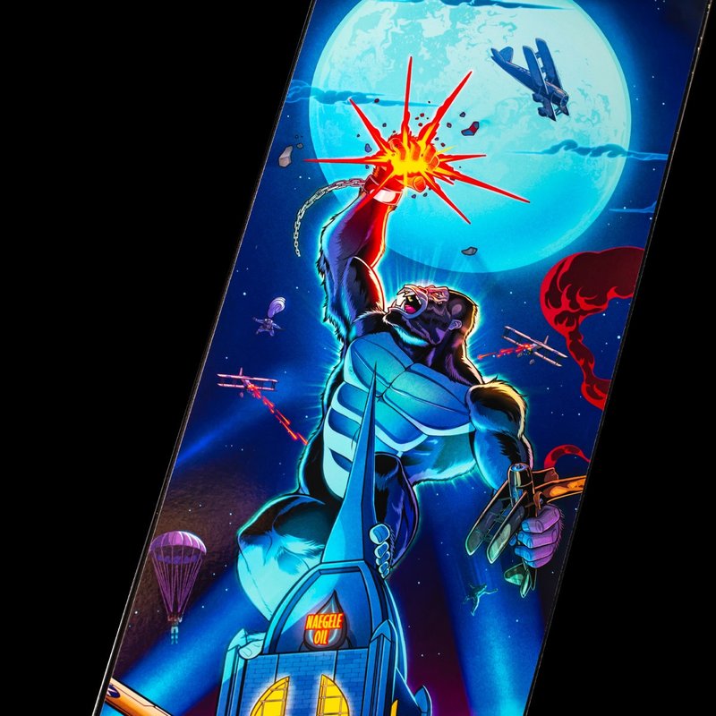 Stern King Kong Myth of Terror Island Premium Pinball Machine playfield showing animatronic Kong figure, biplane toy, giant spider, NYC train car lock, and various ramps and targets.