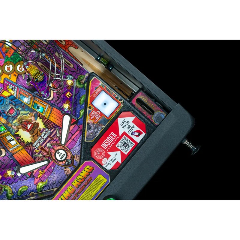 Stern King Kong Myth of Terror Island Pro pinball machine bottom arch with the Insider Connected QR reader and apron instruction cards