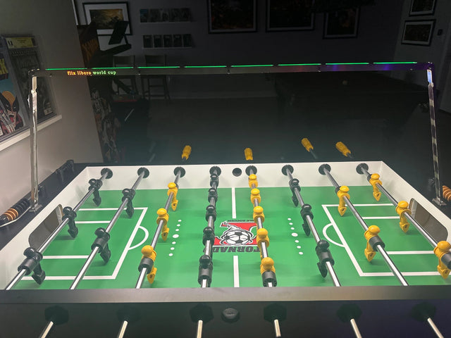 Foosball table light above a Tornado table shared by keven patten